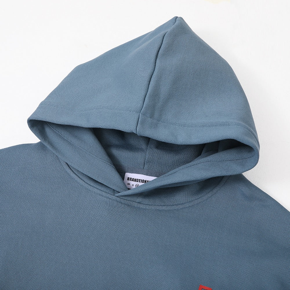 هودي أزرق مطبوع "Not Here Yet" مع غطاء رأس